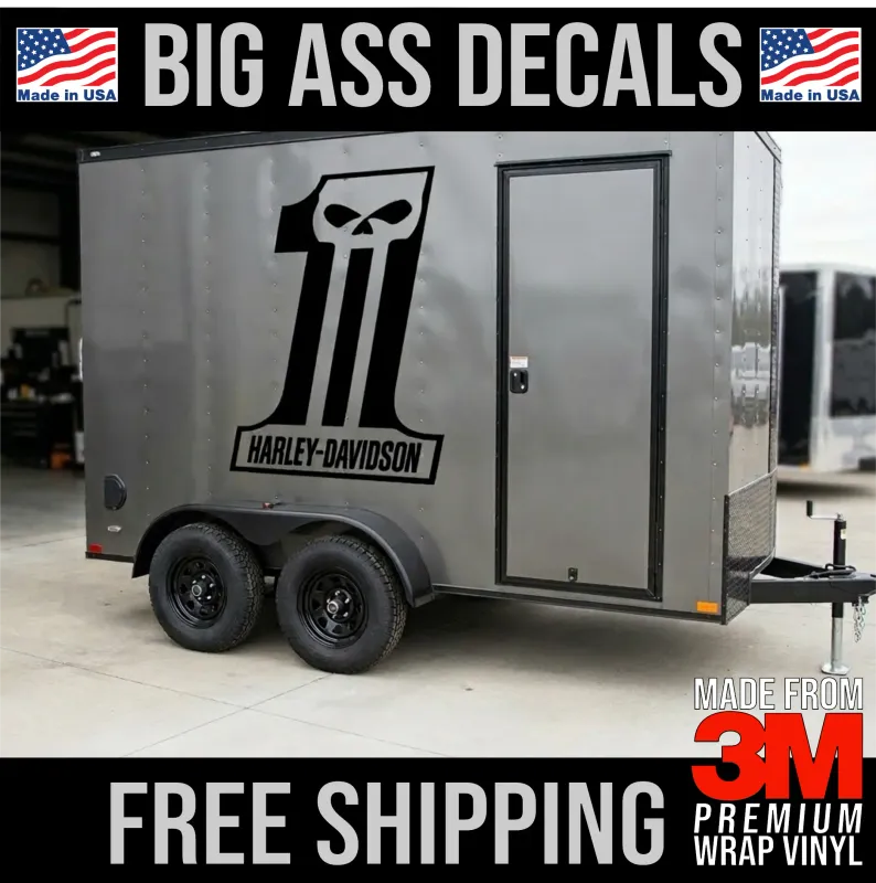 Large black Harley-Davidson Number 1 Skull vinyl decal applied to the side of a silver enclosed motorcycle trailer.