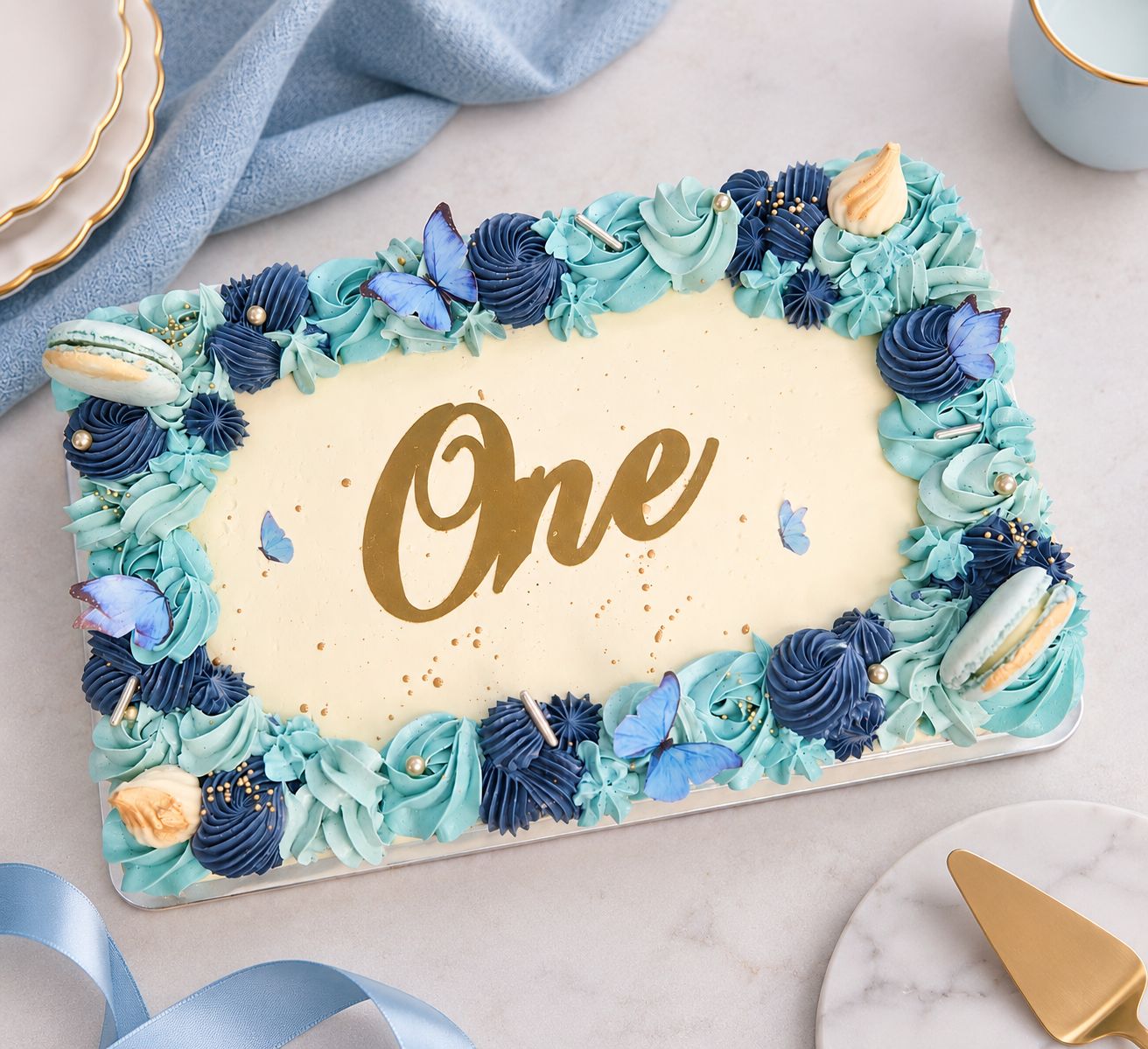 Light blue butterfly sheet cake with Swiss meringue buttercream and personalised message.