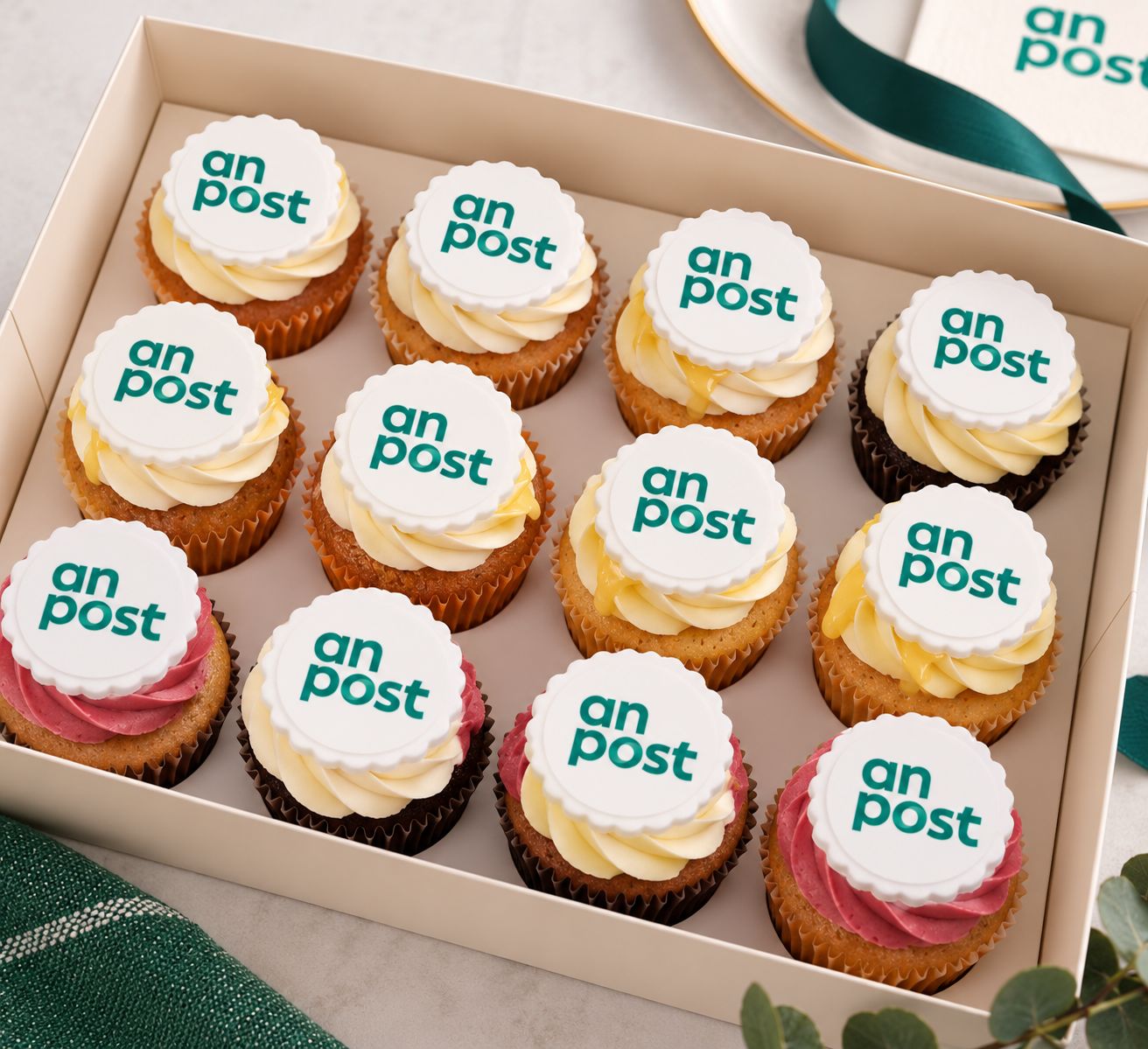 Branded corporate cupcakes with edible company logo toppers