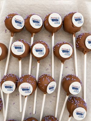 Branded corporate cake pops with edible company logos and Belgian chocolate coating