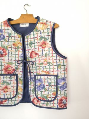 Gilet matelassé  sans manche fleur orangé doublé bleu marine