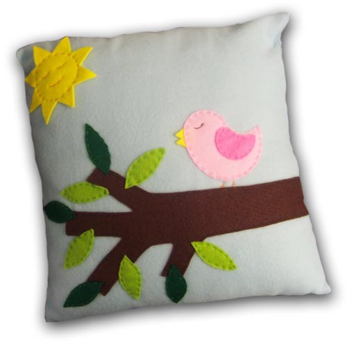 Bird in a tree cushion cover