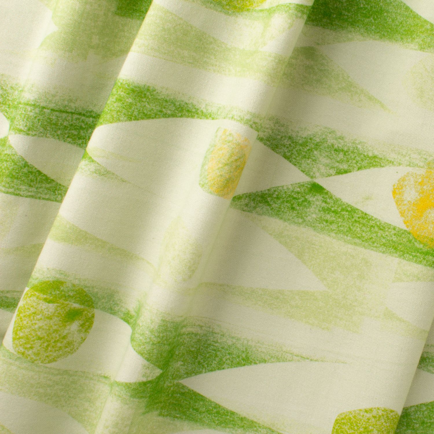 Iris Leaf geometric fabric with angular forms and circles in green on cotton-linen