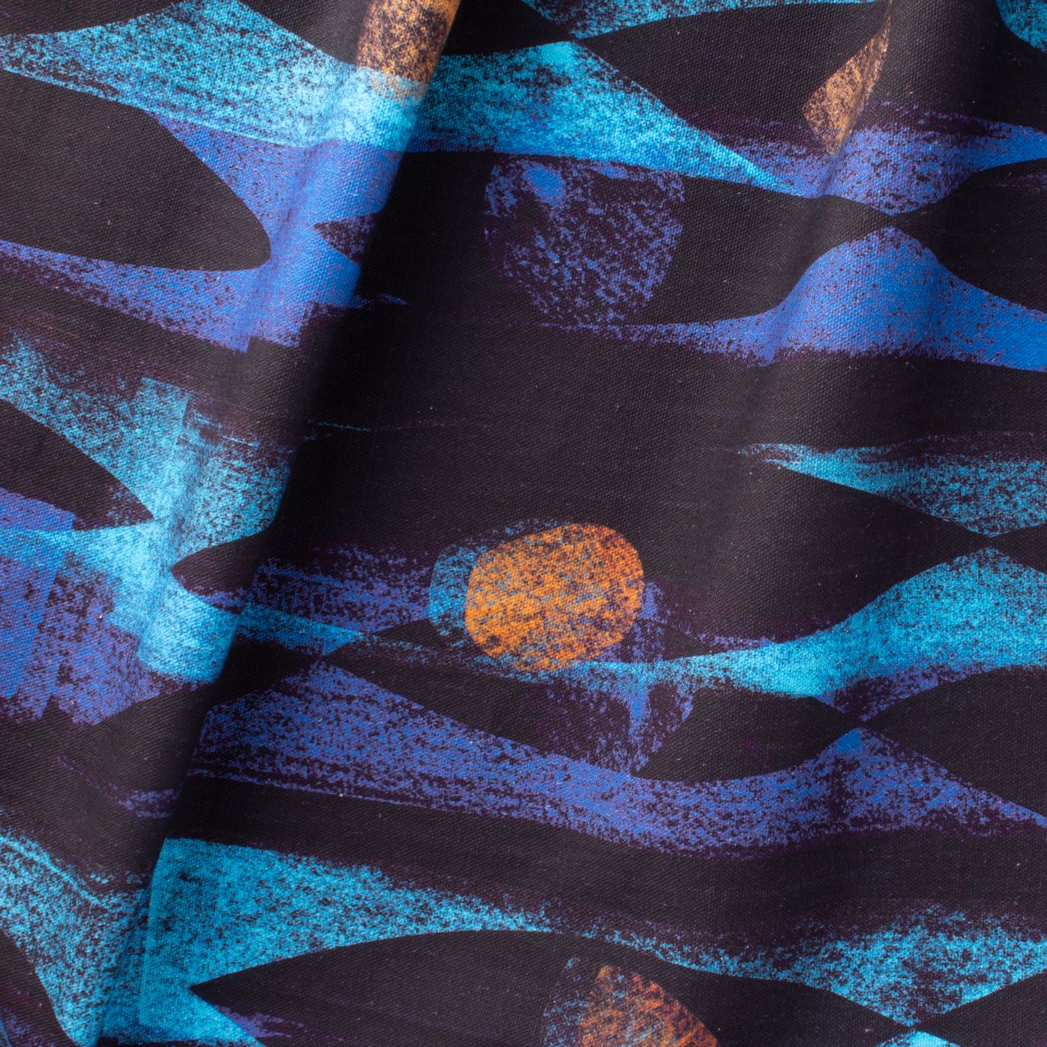 Iris River geometric fabric with angular forms and circles in blue on cotton-linen