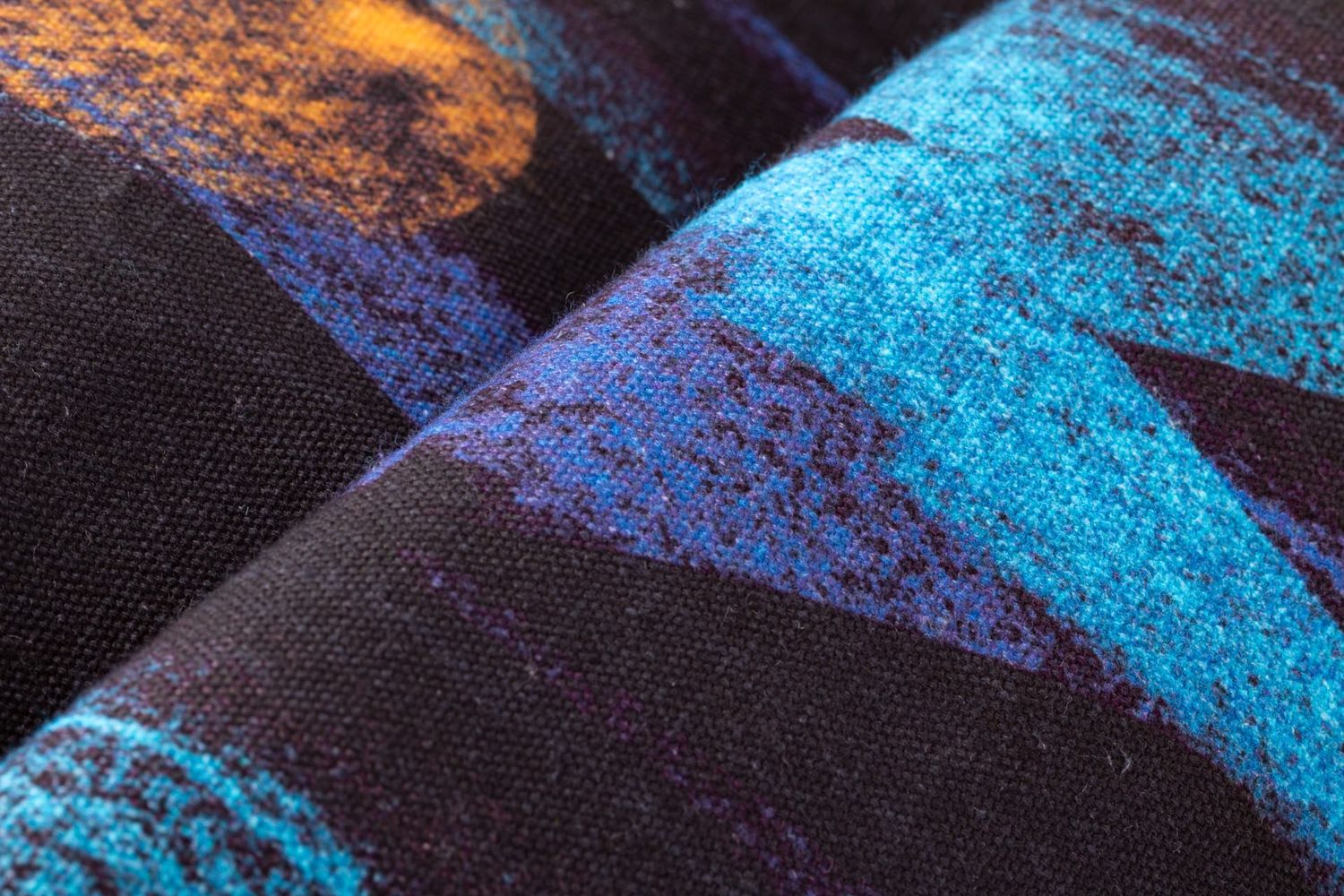 Close-up detail of Iris River fabric showing crisp cut-out edges and texture