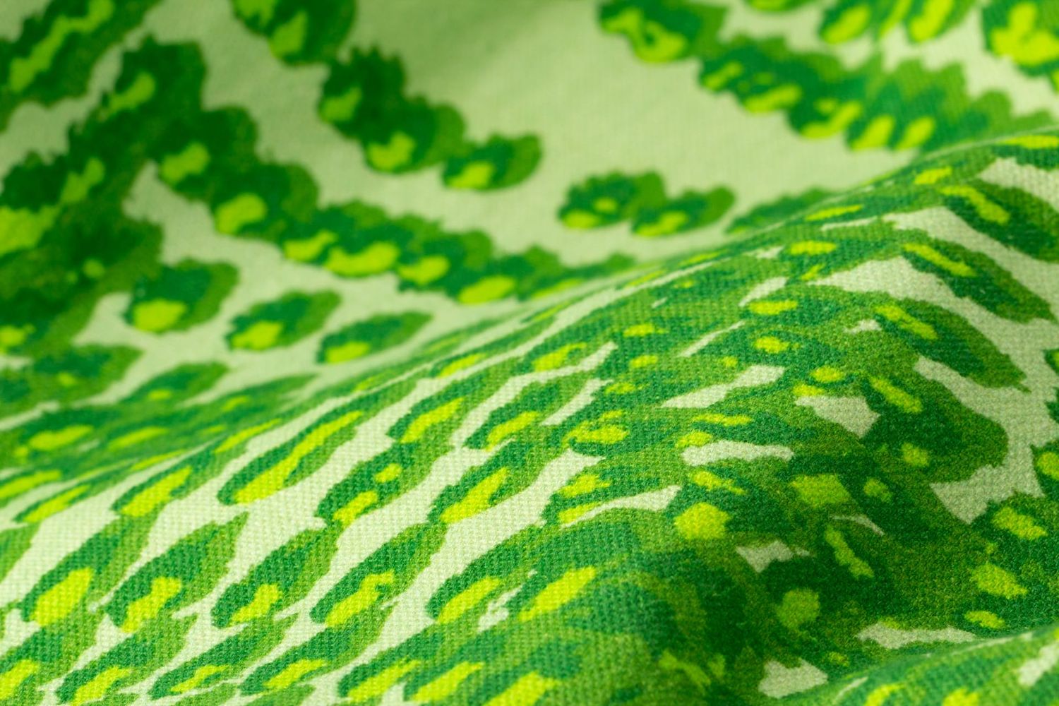 Close-up detail of Pilot Leaf fabric showing flickering flame texture