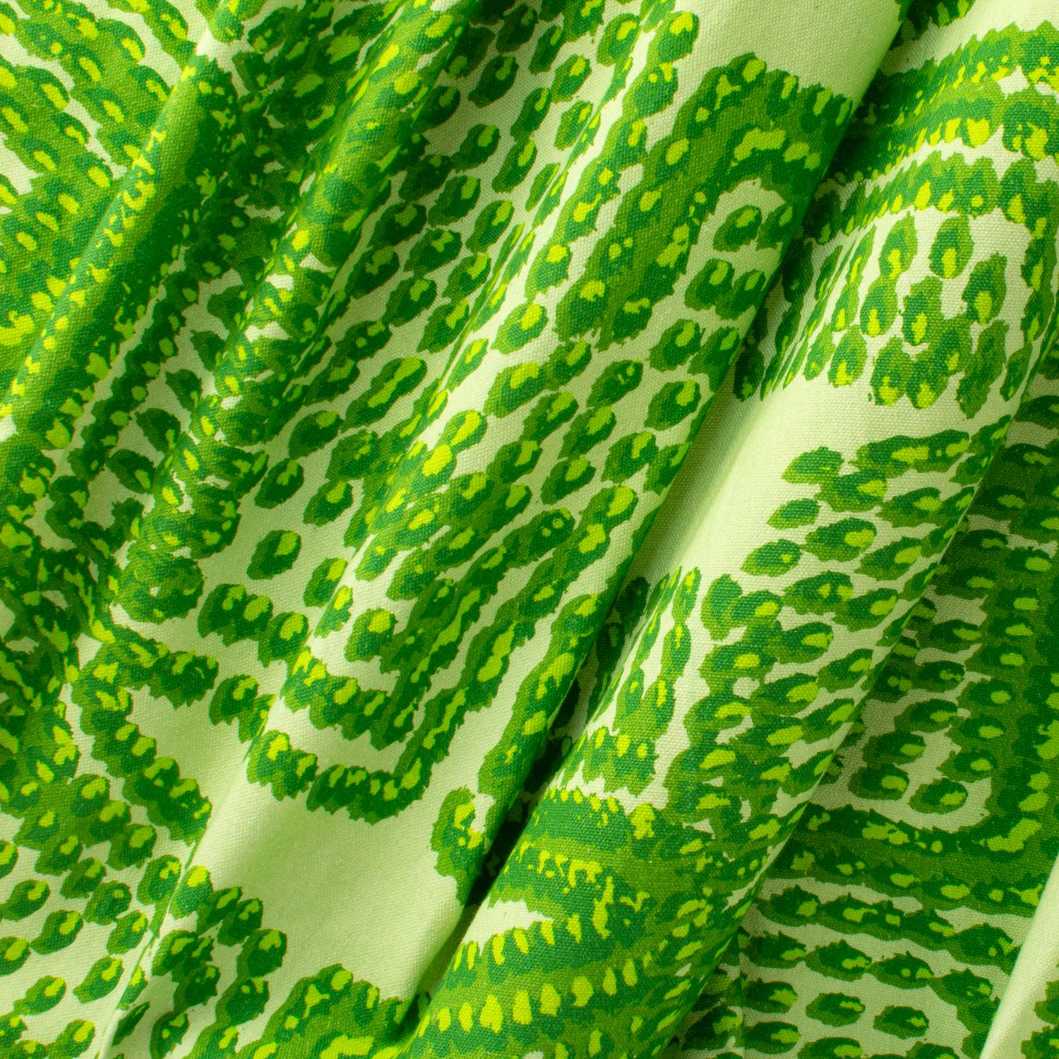 Pilot Leaf fabric displaying scaled-up flame-like marks in green on cotton-linen