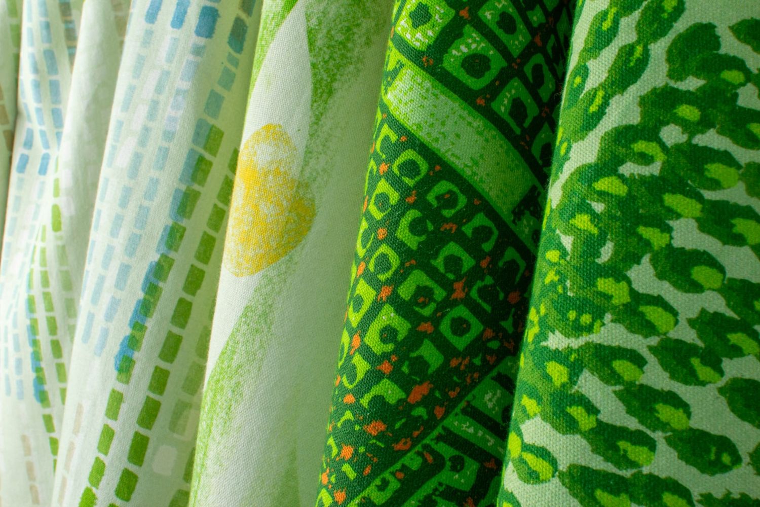 Ampli collection Leaf colorway group showing Swan, Quiver, Pilot and Iris patterns in green tones