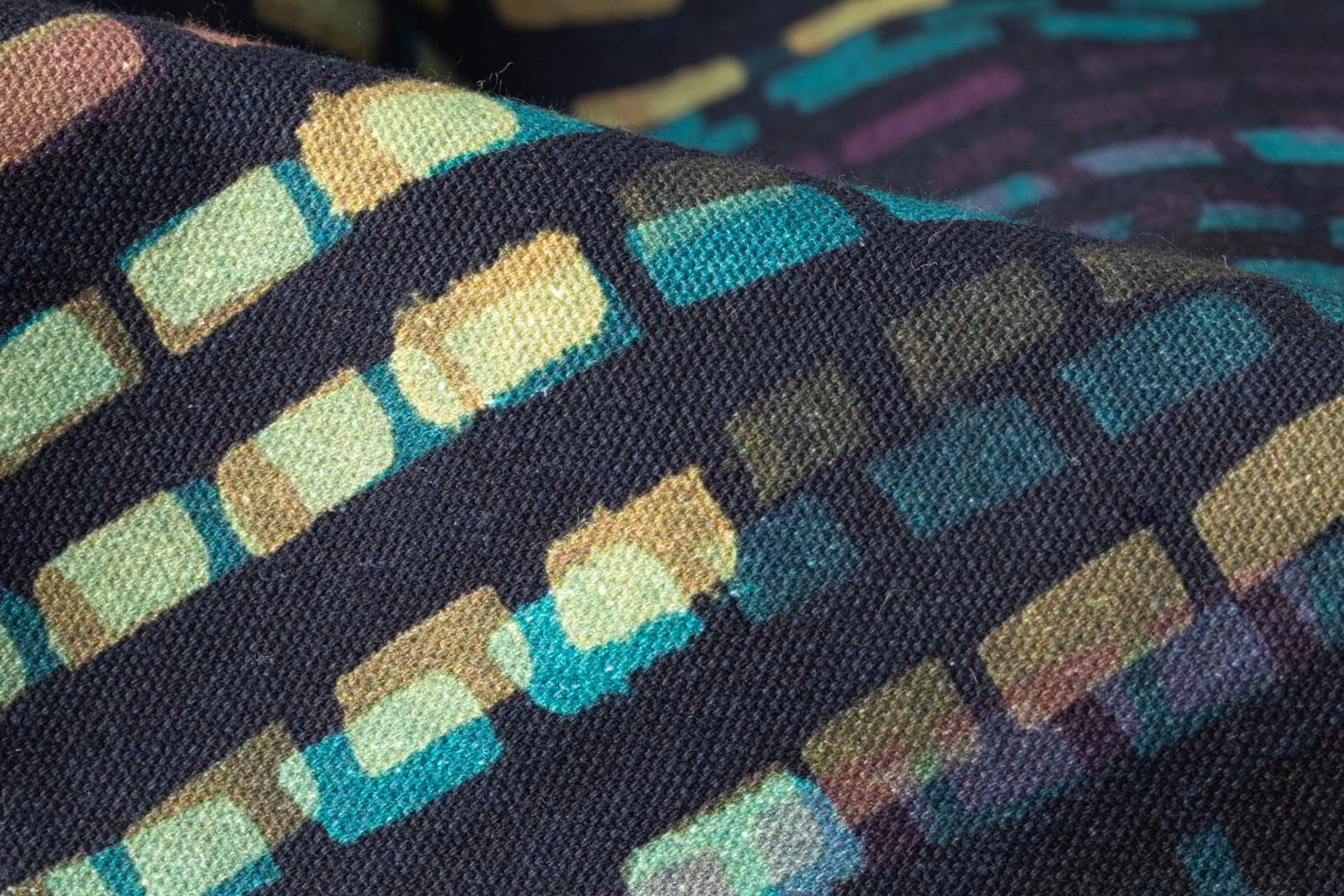 Close-up detail of Swan River fabric texture showing hand-drawn rippling marks