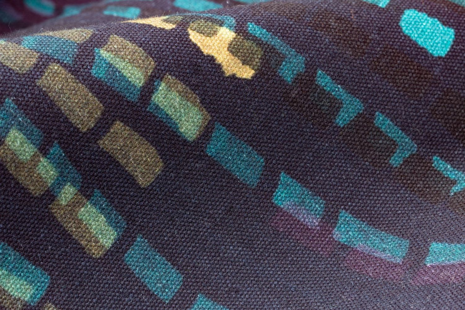 Close-up detail of Swan River fabric texture showing hand-drawn rippling marks