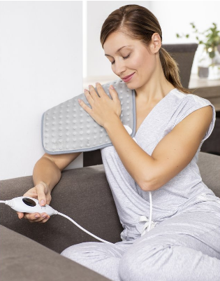 Electric 42 x 32 cm Heat Pad, perfect for soothing your feet, neck, and back. Provides targeted warmth for comfort and relaxation.