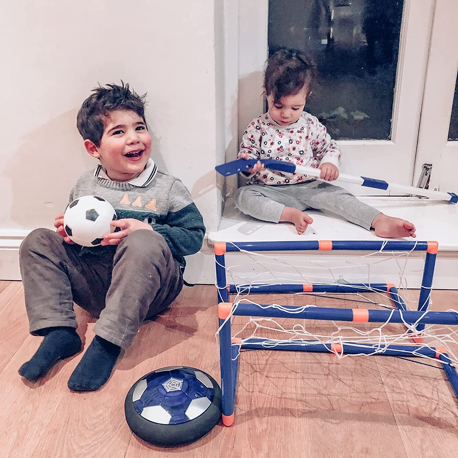 Set of 3 balls, 2 strikes, and 2 football goals for air power football hover ball hockey.