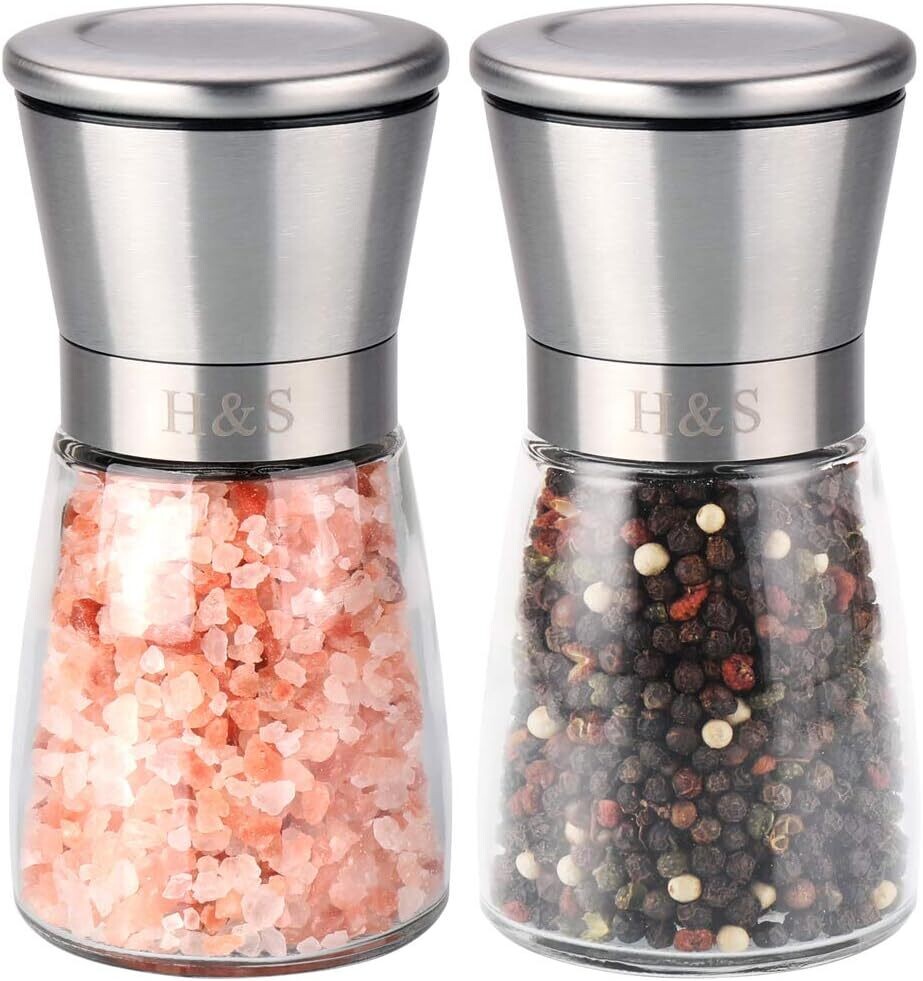 Brushed Spice Mill stainless steel salt and pepper shakers, a salt and pepper mill, and a glass container
