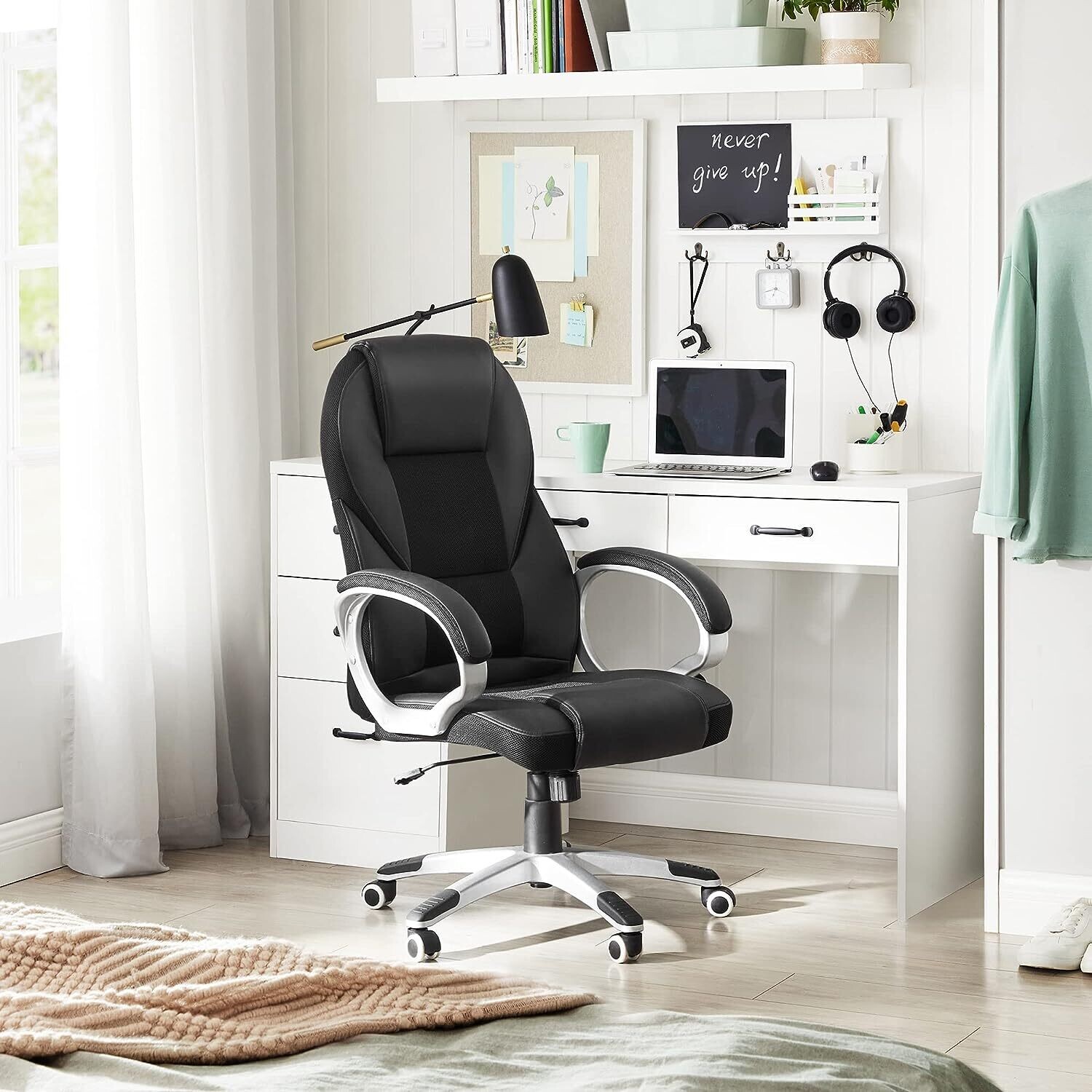 Adjustable Black Ergonomic Executive Office Chair - Durable and Stable Design with Height Adjustment for Enhanced Comfort and Support in the Workplace
