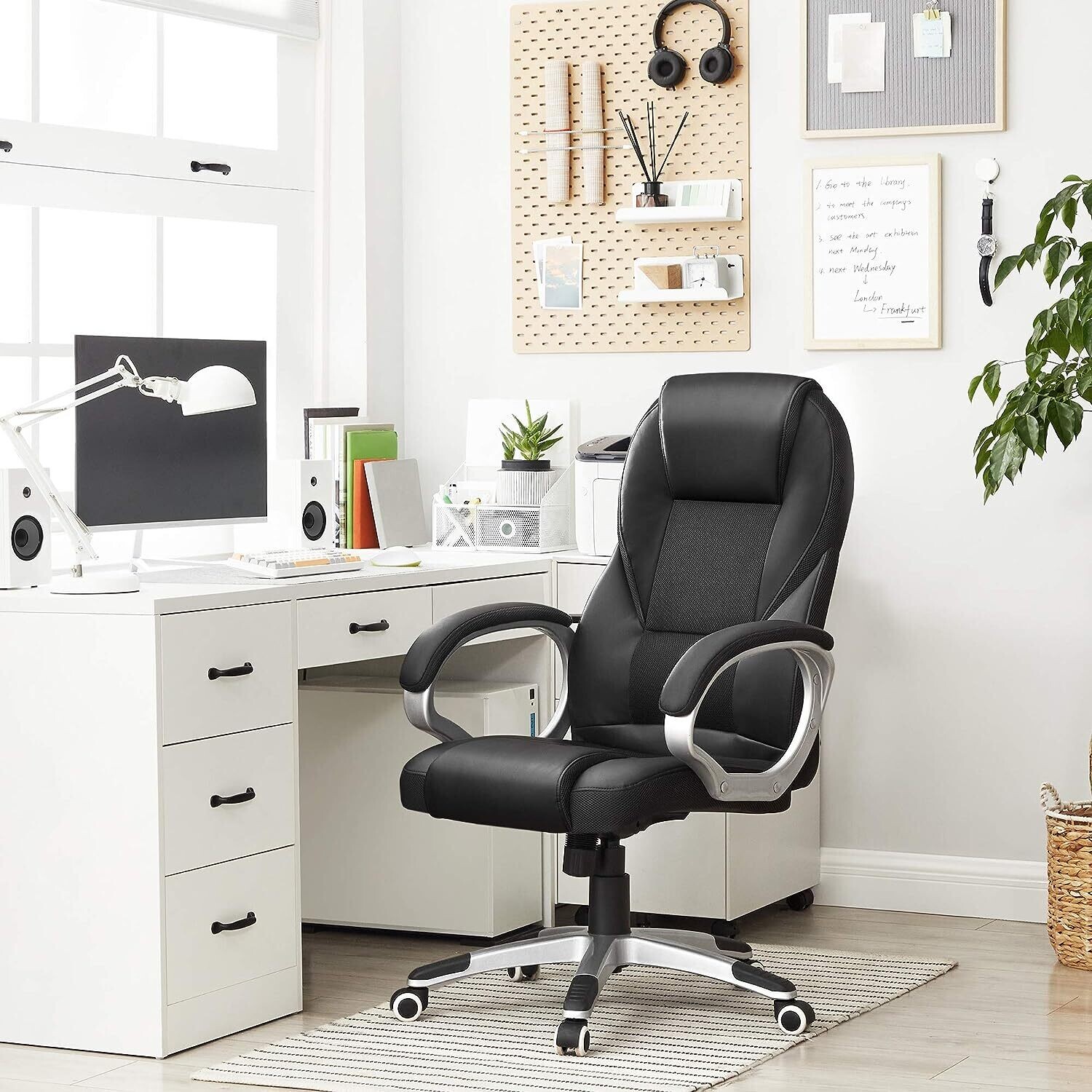 Adjustable Black Ergonomic Executive Office Chair - Durable and Stable Design with Height Adjustment for Enhanced Comfort and Support in the Workplace