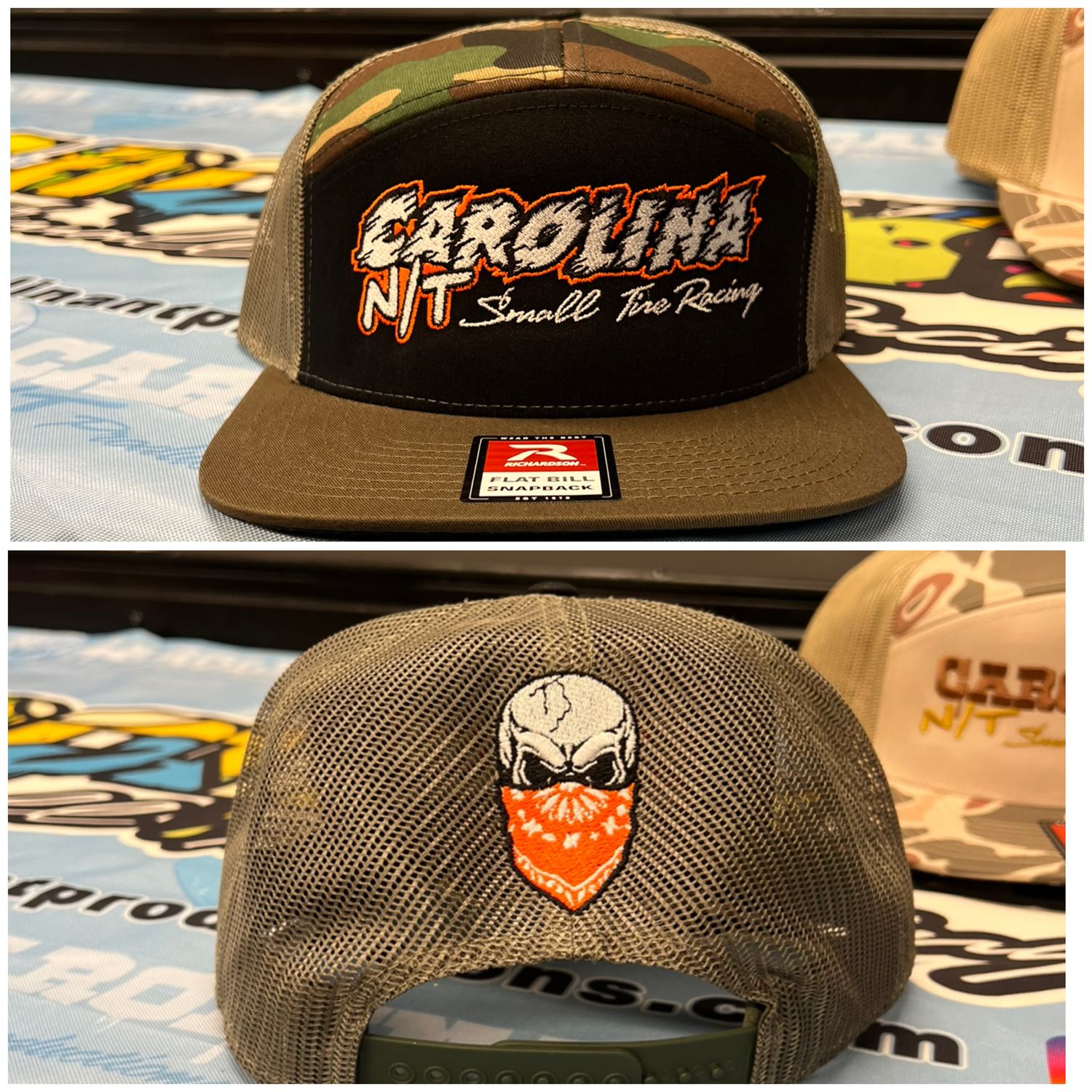 Camo /neon orange/white letters 7 panel hat