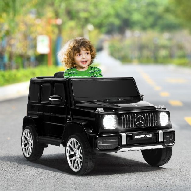 Mercedes Benz G-Klasse Elektroauto mit Musik & Scheinwerfer für Kinder ab 3 Jahre alt schwarz