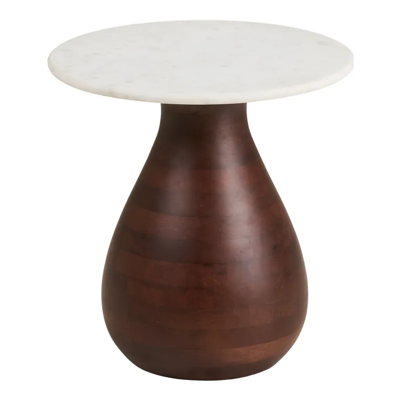 Heide Beistelltisch Mangoholz/Marmor Dunkelbraun/Weiss Ø40x41 cm Runder Heide Beistelltisch mit weisser Marmorplatte und dunkelbraunem Mangoholz-Fuss, Ø40x41cm. Edles Design.