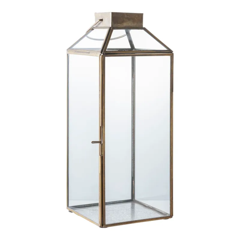 Mysore-Laterne Metall/Glas Antikmessing-Optik II Mysore-Laterne, Antikmessing-Optik, Metall/Glas, 13,5x13,5x35cm. Stimmungsvolle Beleuchtung für Schweizer Zuhause.