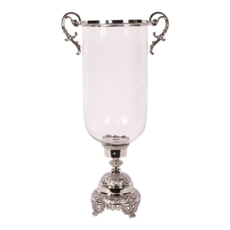 Windlicht Hurricane Assiya Sturmlaterne Silber Messing Glas 59.5 cm Versilberte Sturmlaterne Hurricane Assiya mit Griffen & Glas, 59.5cm. Imposanter Blickfang fürs Schweizer Zuhause
