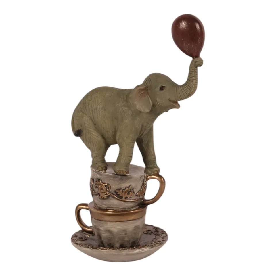 Elefant Figur Tassen Ballon Polyresin Braun 21 cm Elefant Figur auf Tassen, Skulptur, Polyresin, braun, 20x14x9cm im verspielten Zirkus-Stil.