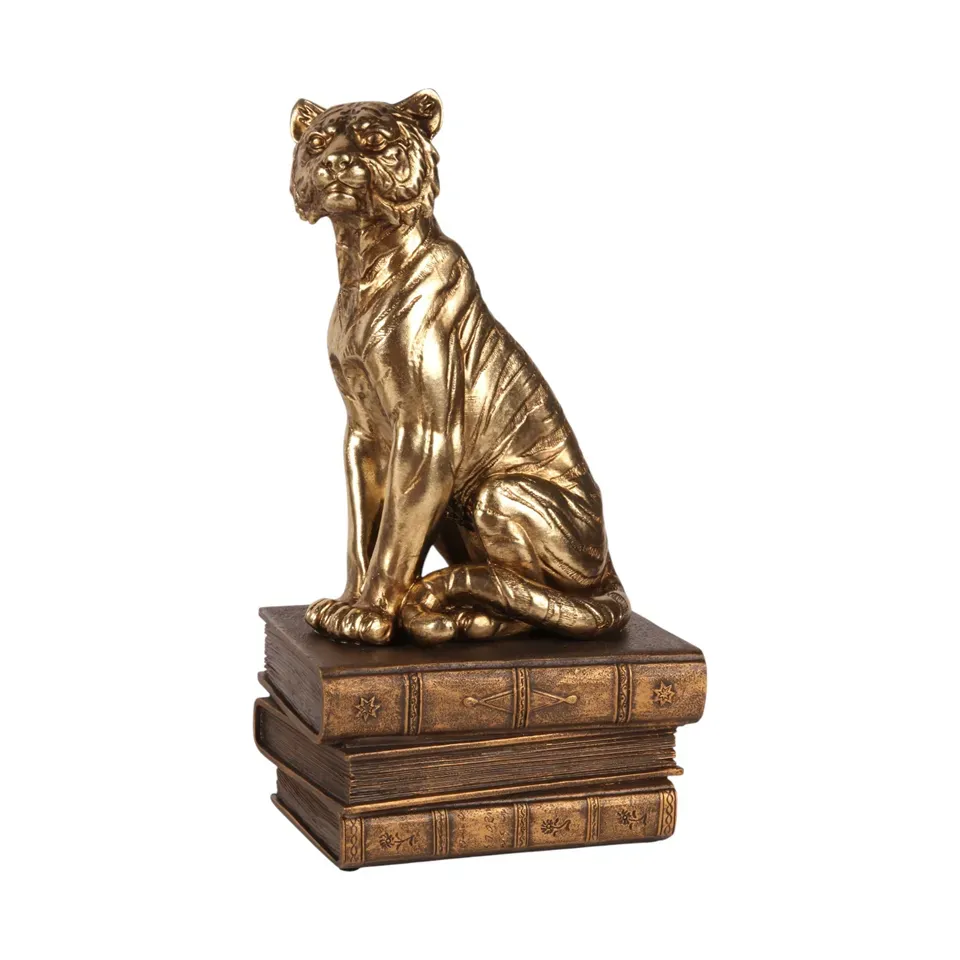 Tiger auf Büchern II Skulptur Polyresin Gold 29 cm Tiger auf Büchern II, Skulptur, Polyresin, gold/braun, 29x11,5x16cm im klassischen Safari-Barock-Stil.
