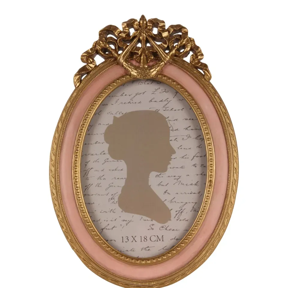 Bilderrahmen Rosa 13 x 18 cm oval im Hochformat Rosa ovaler Bilderrahmen aus Polyresin für Fotos 13 x 18 cm, Hochformat, mit goldfarbenen Barockornamenten