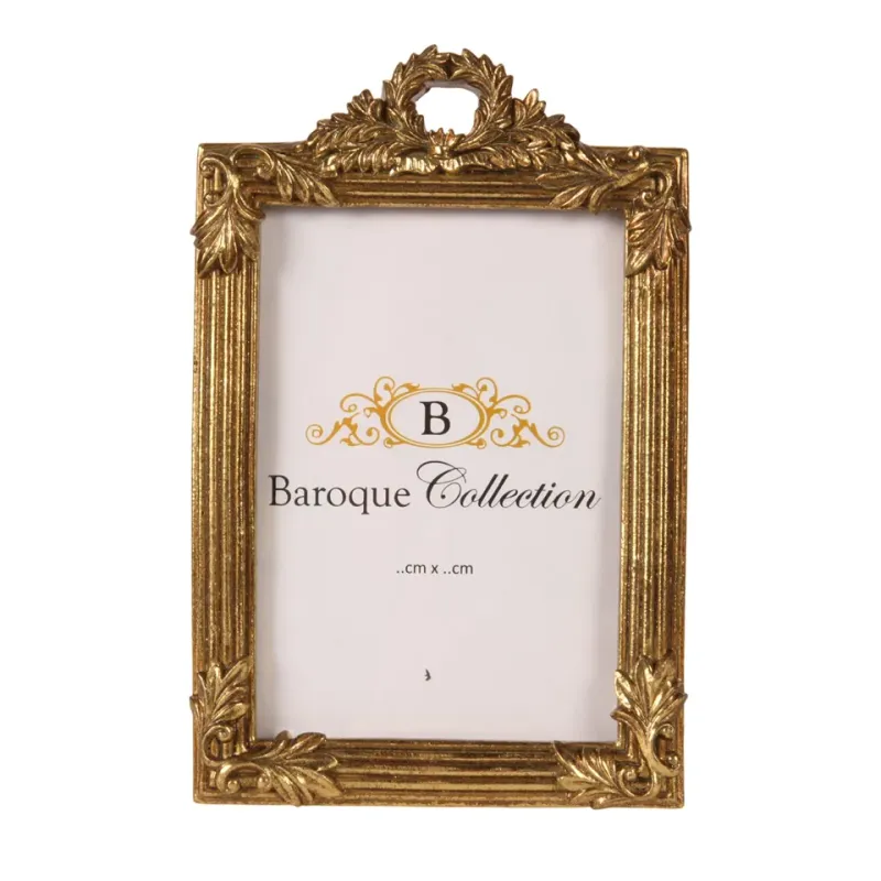 Bilderrahmen Gold 9 x 13 cm aus Kunstharz mit Blattornamenten Goldfarbener Bilderrahmen aus Kunstharz für Fotos 9 x 13 cm mit Blattornamenten und dekorativem Aufsatz