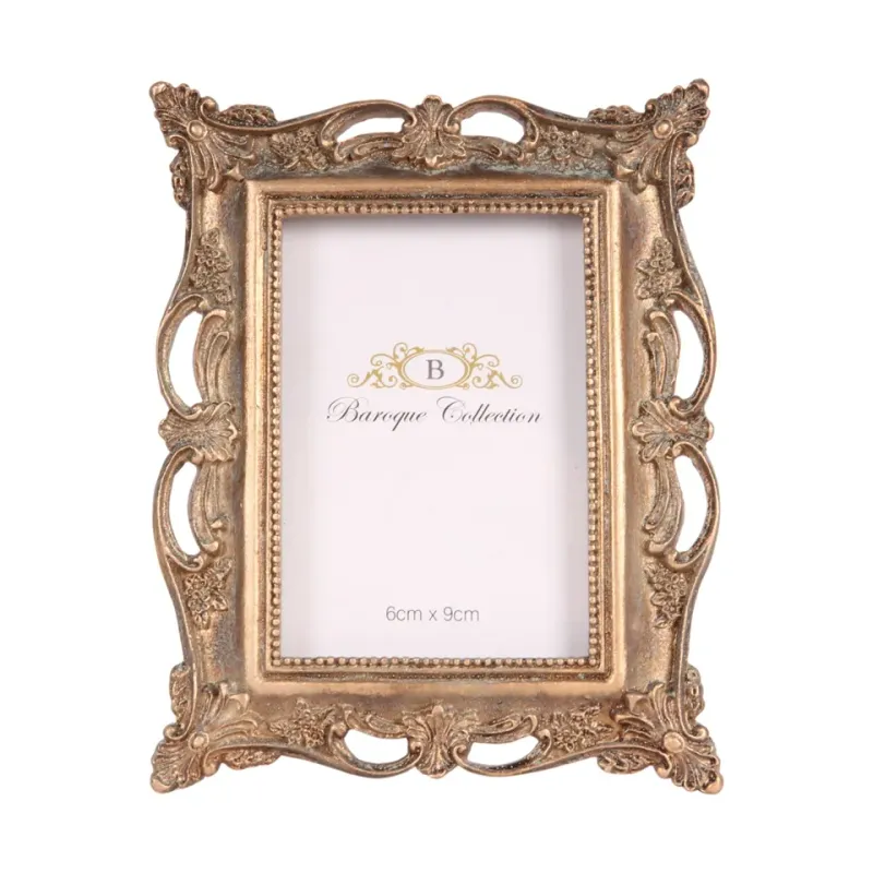 Bilderrahmen Gold 6 x 9 cm aus Kunstharz mit Ornamenten goldener Bilderrahmen aus Kunstharz für Fotos 6 x 9 cm mit floralen Ornamenten und durchbrochenem Dekor