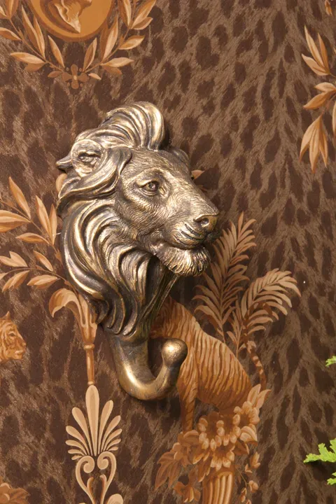 Löwe Wandhaken 17 cm Gold aus Kunstharz