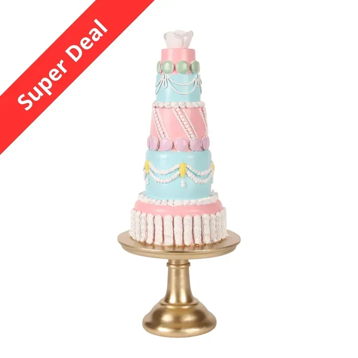 Dekofigur Torte 46 cm in Rosa und Türkis auf einem goldfarbenen Fuss Dekorative Tortenfigur aus Kunstharz in Rosa und Türkis auf einem goldfarbenen Fuss