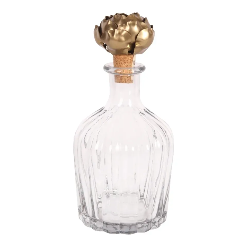 Gerillte Glasflasche mit goldenem Rosenverschluss