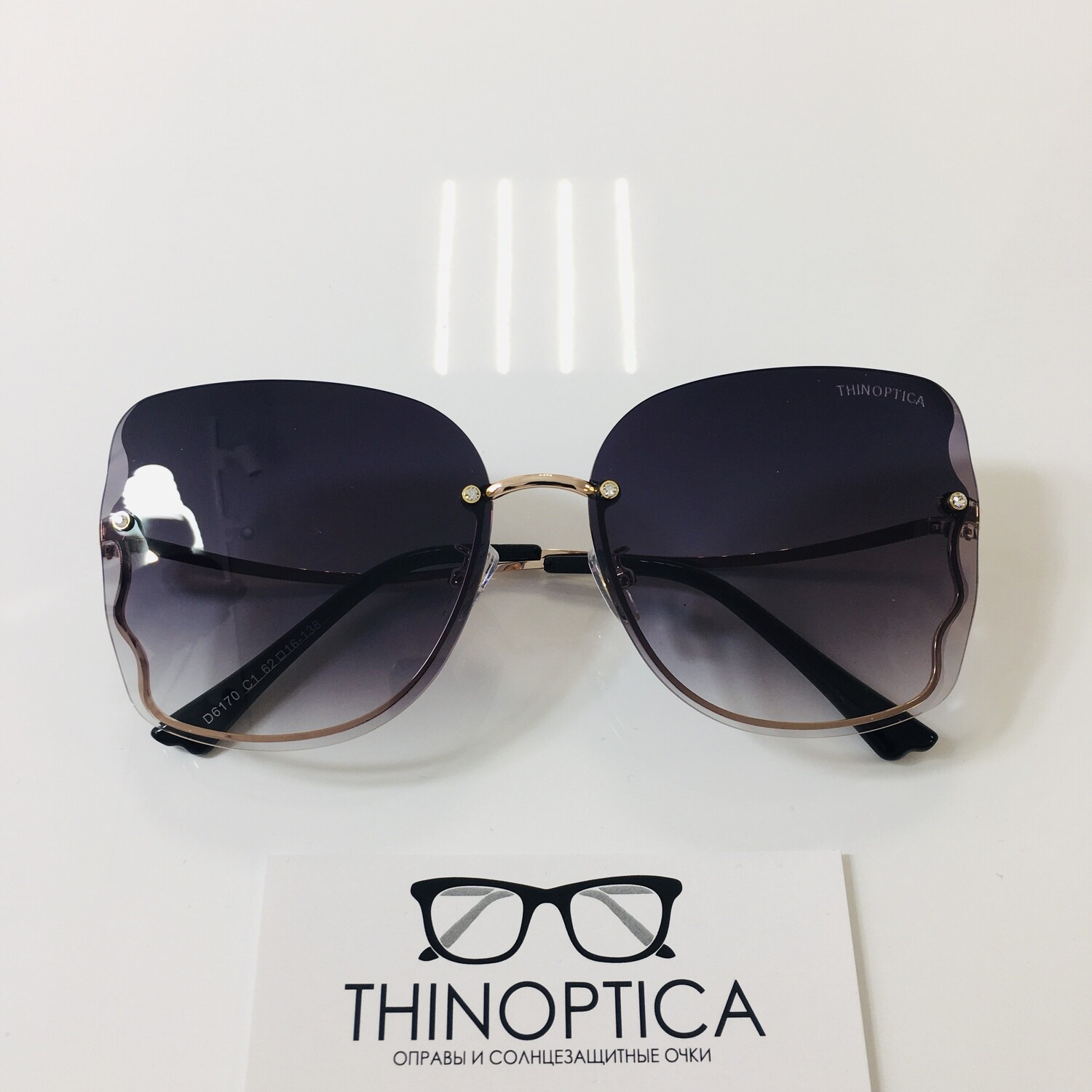 Солнцезащитные очки THINOPTICA D6170