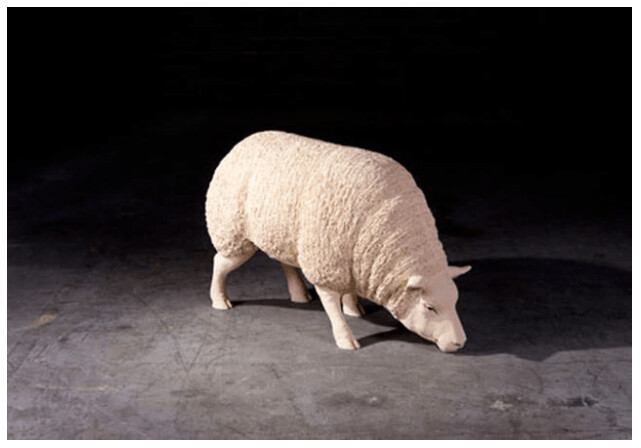 SHEEP HEAD DOWN GRAZING SCULPTURE
