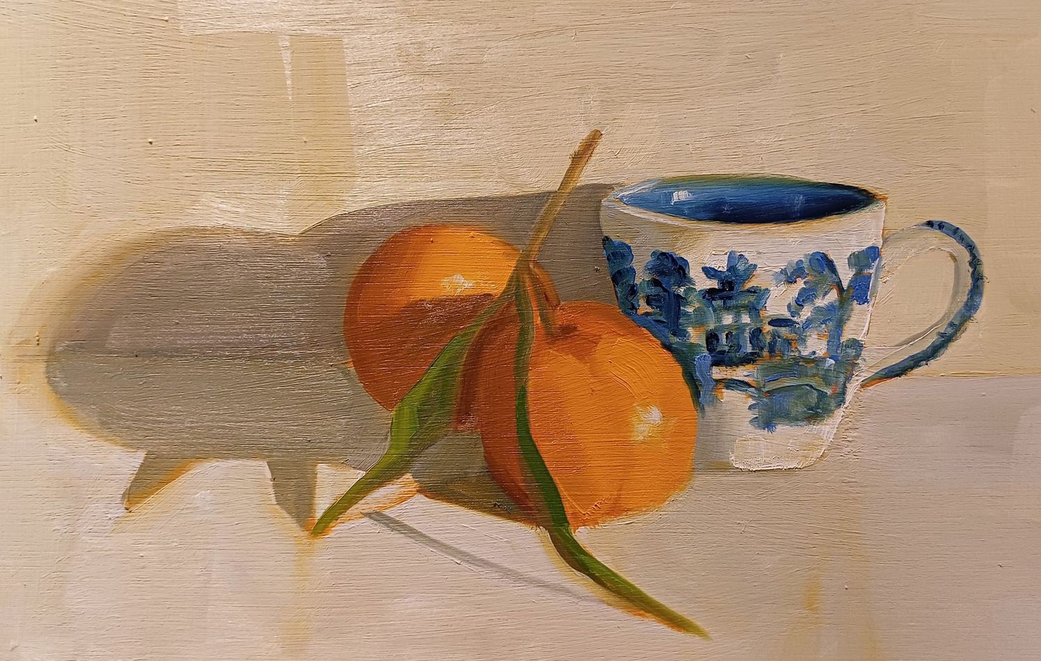 Tea  Cup and Clemantines