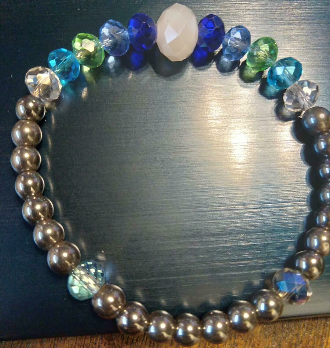 "REDo" Hemitite Beads with blue and green crystals with 1 white vintage bead