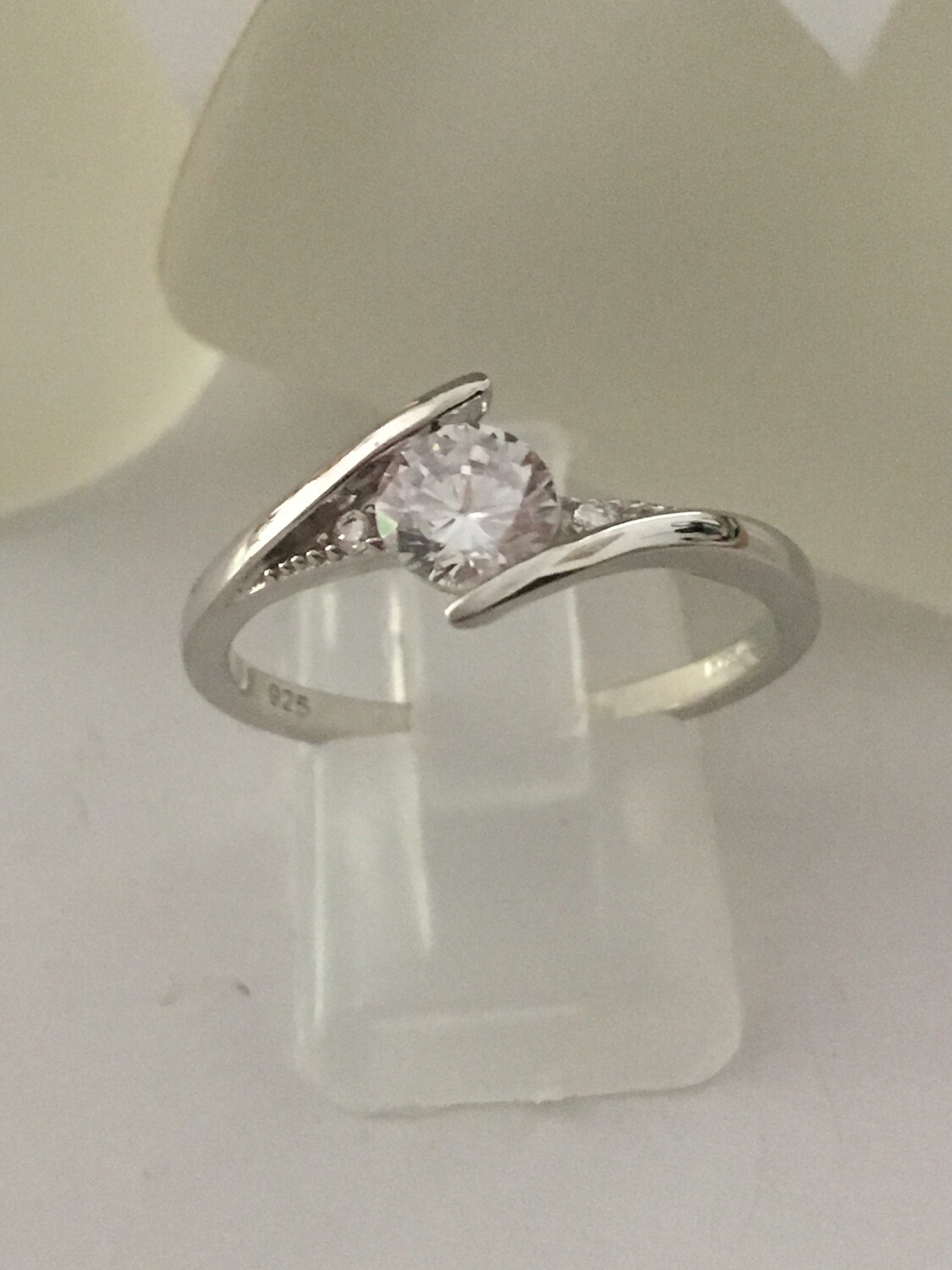 Stuck Between Clear CZ Ring