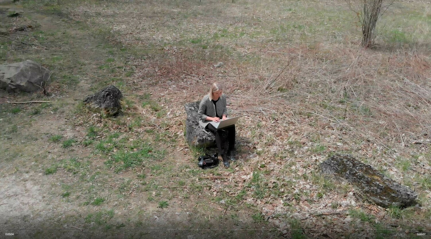 Woman Typing on Rock 1 Woman Typing on Rock 1
