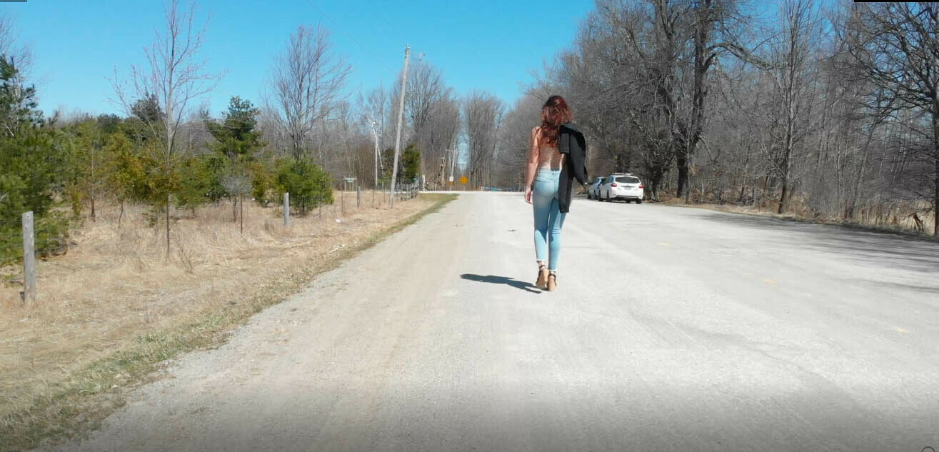 Woman Walking on Country Road 1 Woman Walking on Country Road 1