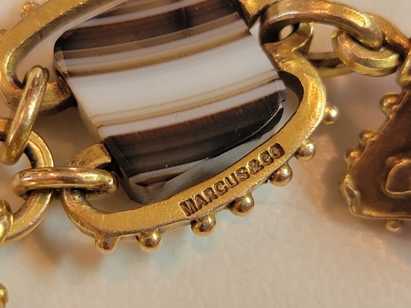 Marcus & Company bracelet made of 14k Gold, Amethyst and Banded Agate. Fits a 6.5-7" wrist