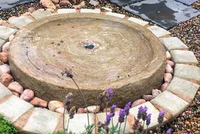 Fibreglass Millstone &amp; Bubbler Pond Length:580mm Width:910mm Height:500mm