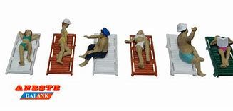 ANESTE FIGURAS BAÑISTAS COM TUMBONA HO