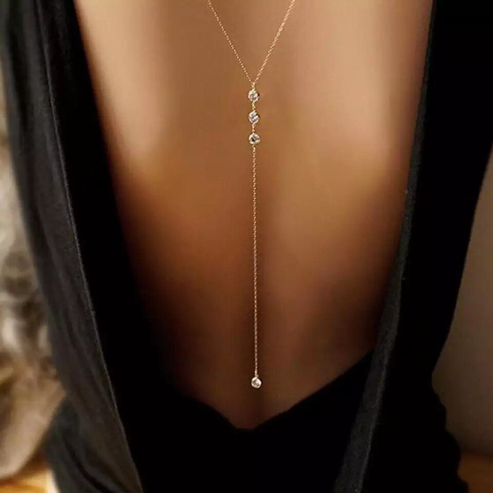collier bijou de dos mariage doré pierre blanche dos nu