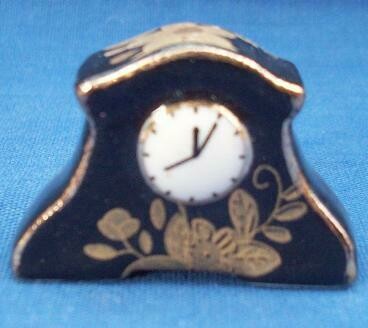 Black Ceramic Clock with Gold Design