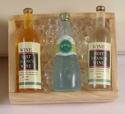 Three Wine Bottles in Crate