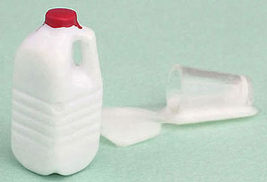 Spilled milk with milk bottle