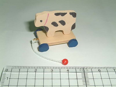 Pull along cow toy