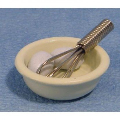 Bowl with whisk &amp; eggs
