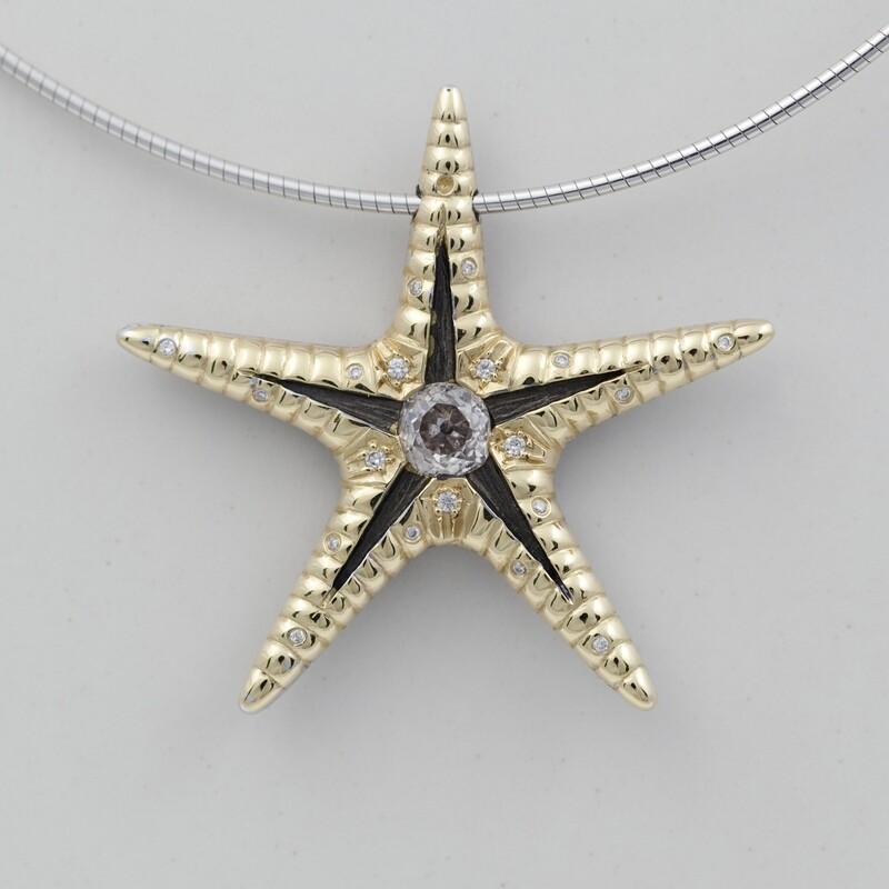 Gold and diamond starfish pendant