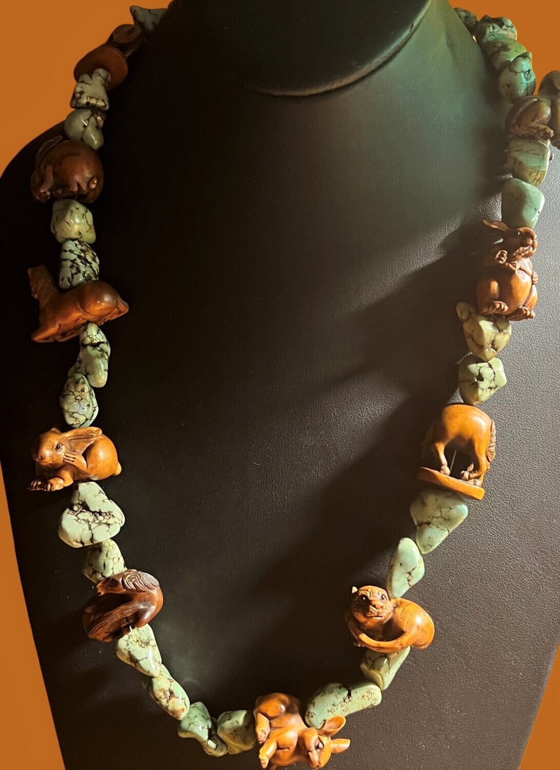 Turquoise Necklace with Carved and Signed Wooden Beads